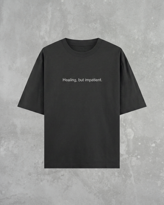 HEALING, BUT IMPATIENT - HEAVYWEIGHT OVERSIZED T-SHIRT