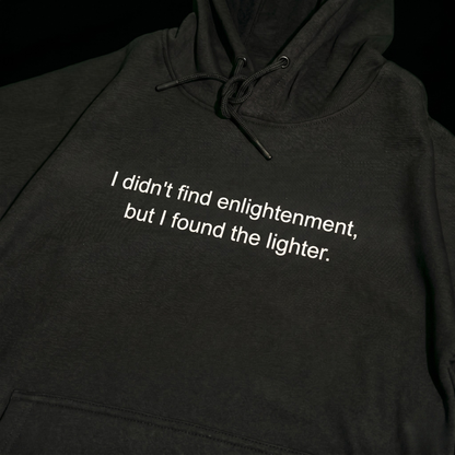 Black hoodie with text 'I didn't find enlightenment, but I found the lighter'